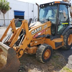 Backhoe case 580 cat John deer