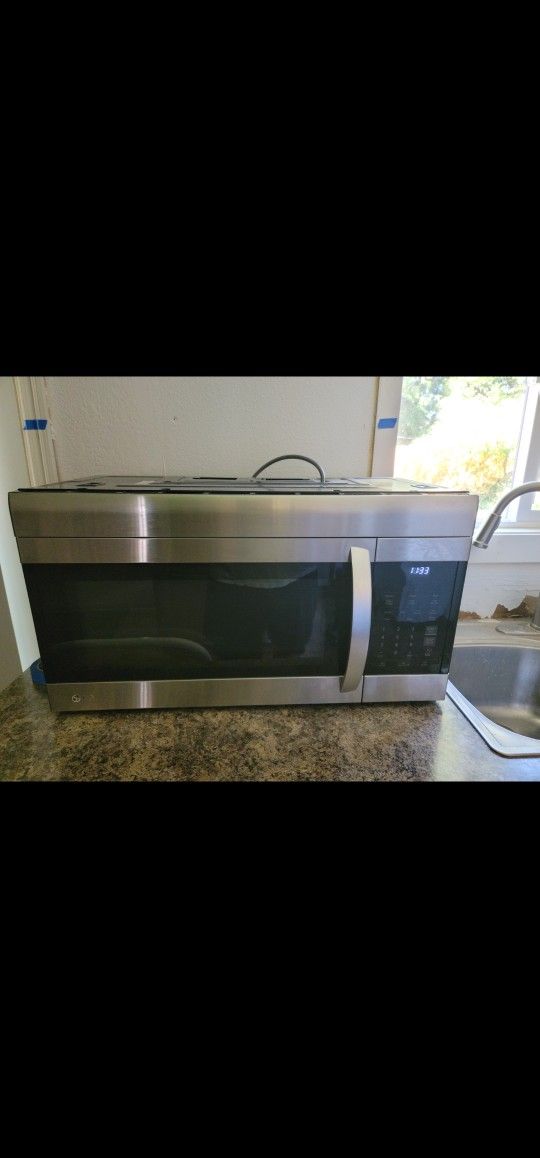Microwave Oven Over Stove With Vent Fan Etc.