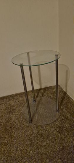 Two glass corner tables