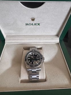 Rolex Sub Black Dial.