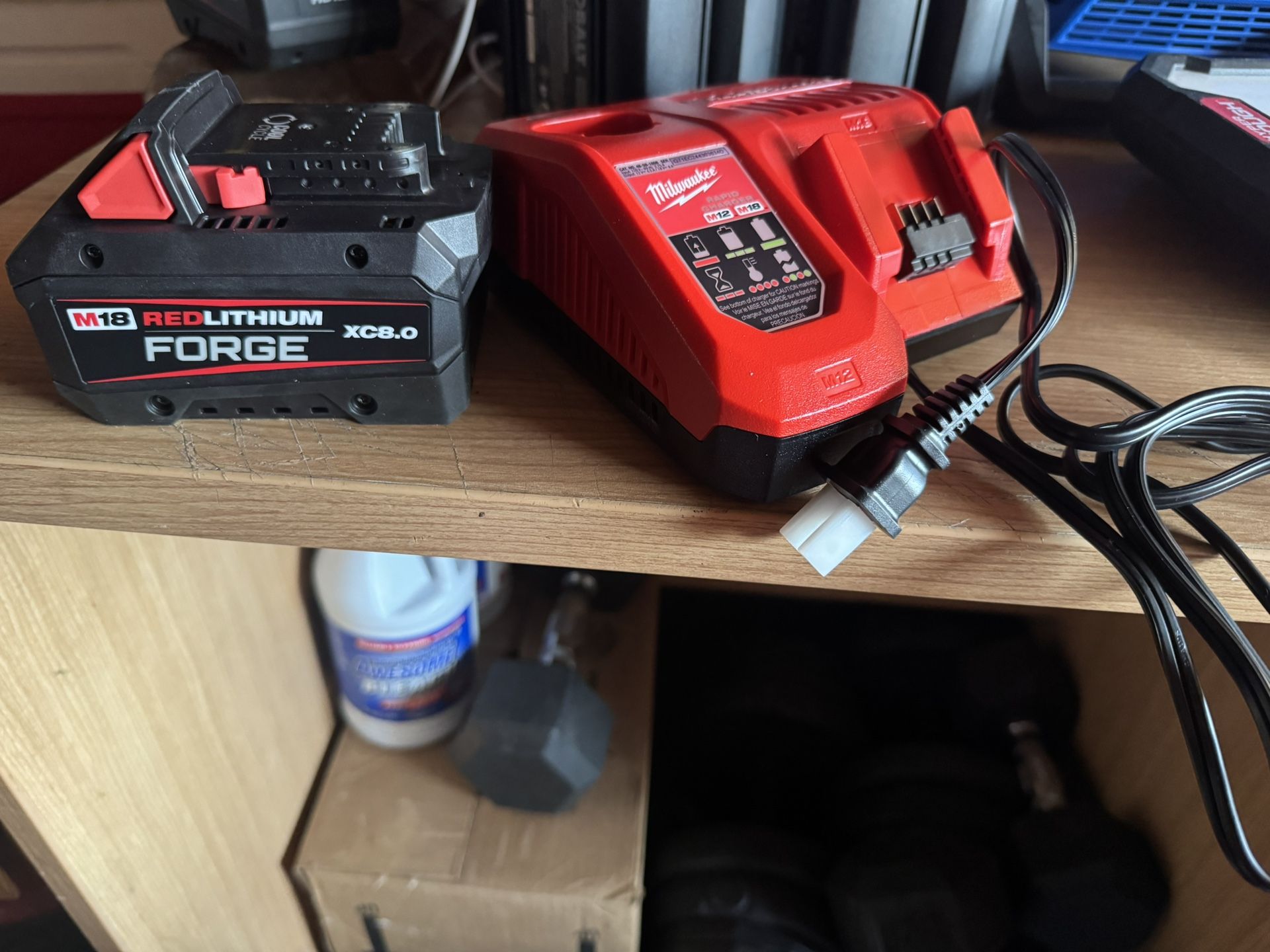 BRANDNEW RAPID CHARGER AND 8.0 FORGE BATTERY