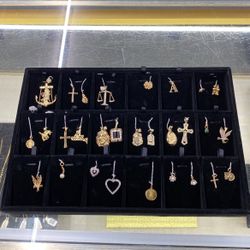 Assorted Gold And Diamond Pendants