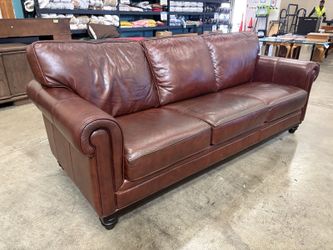 MARTHA STEWART Chocolate Leather Roll Arm Sofa with Dark Finished Wooden Base