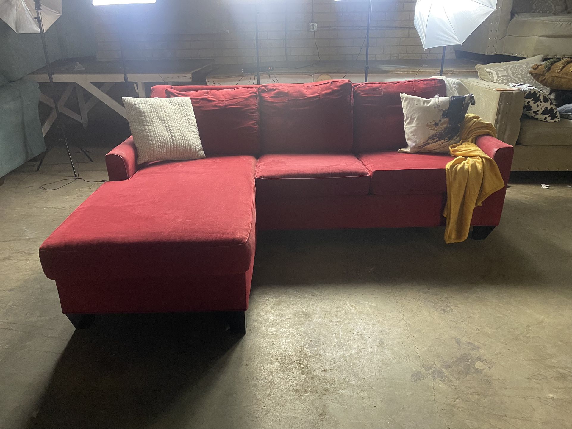 Roman red ashley furniture sectional sleeper!$300 investment