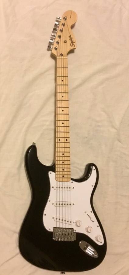 Squier Guitar W Amp