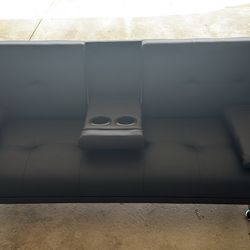66” W Faux Leather Tufted Back Convertible Sofa