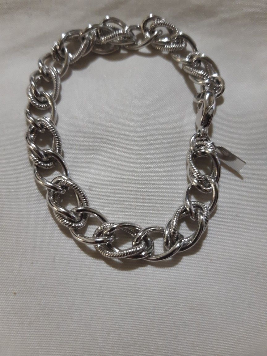 vintage Monet silver figure 8 charm bracelet.