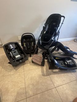 Evenflo Stroller + Car seat + 3 bases + Skateboard
