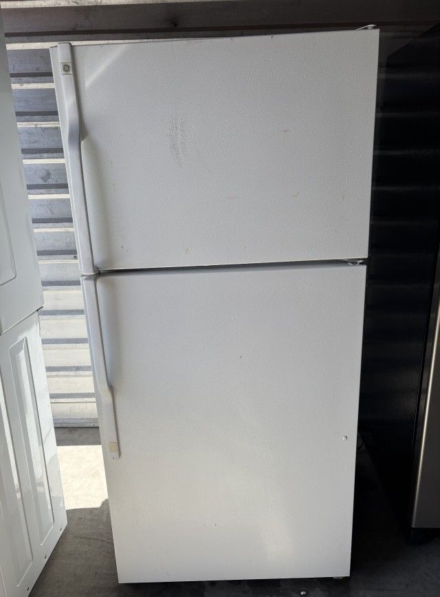 White GE Refrigerator And Freezer