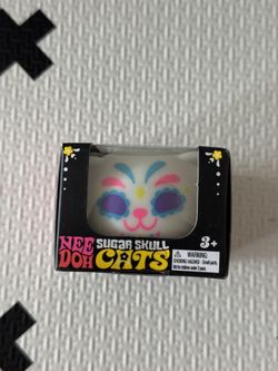 Authentic NeeDoh glow In The dark skull cat in Blue NIB