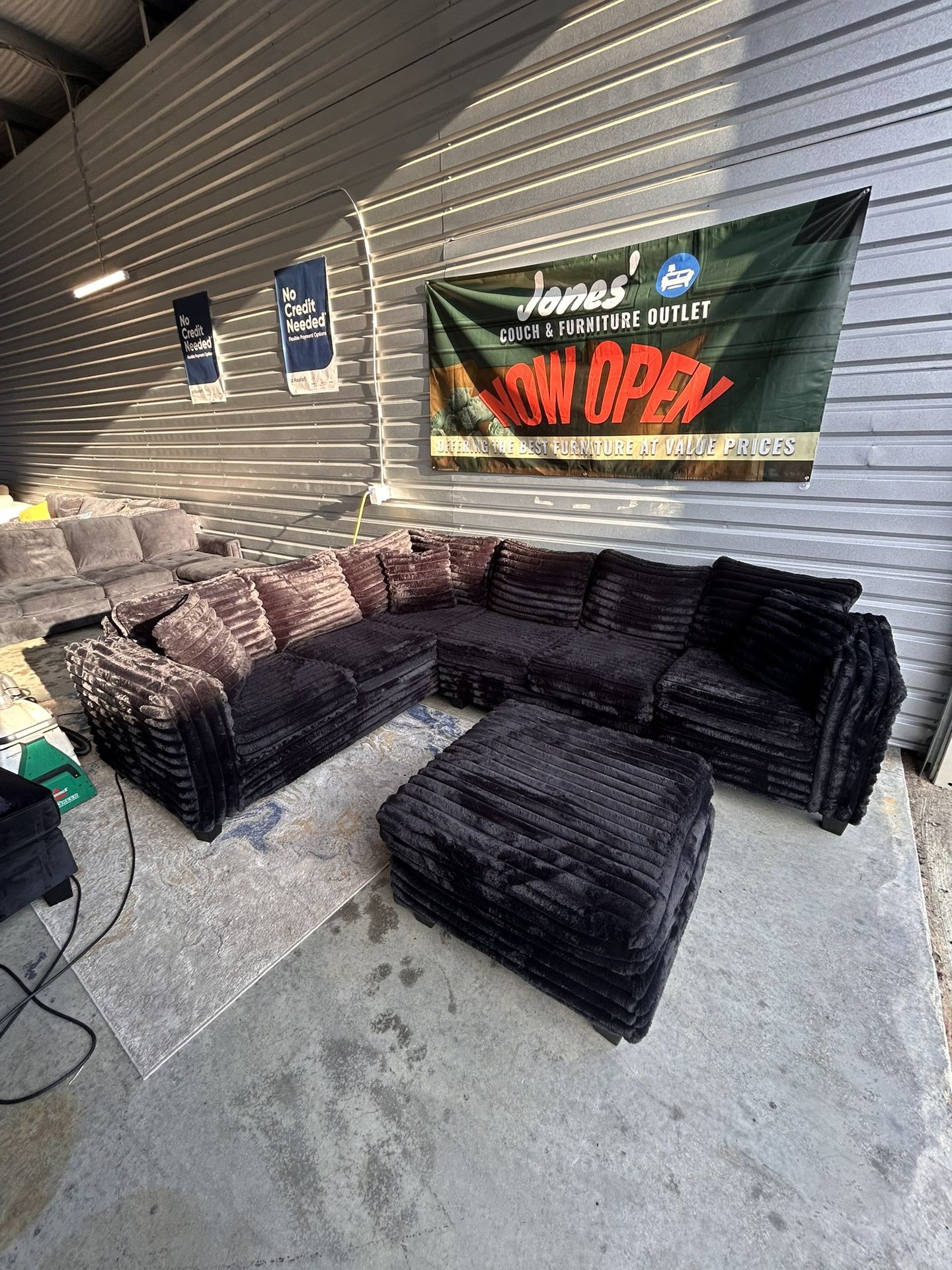 Fluffy Black Sectional W Ottoman