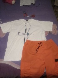 Jesus t-shirt and orange jogging pants