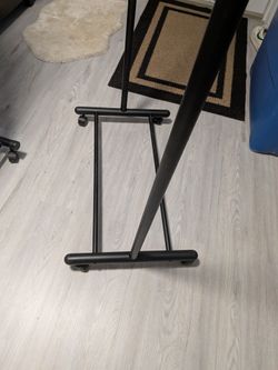 Black Metal Stand with Caster Wheels