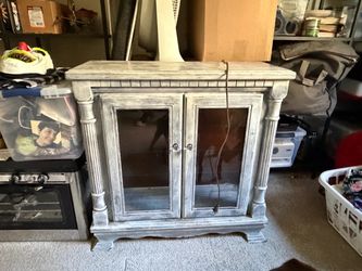 Distressed Gray Wood Cabinet with Glass Doors