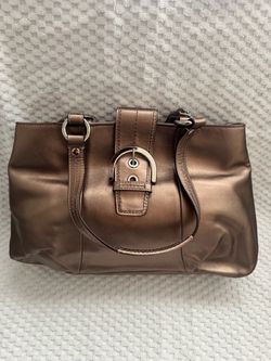 Coach Soho metallic bronze leather buckle tote bag
