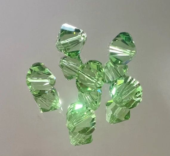144 Swarovski 10mm bicone 5328 Beads in Peridot