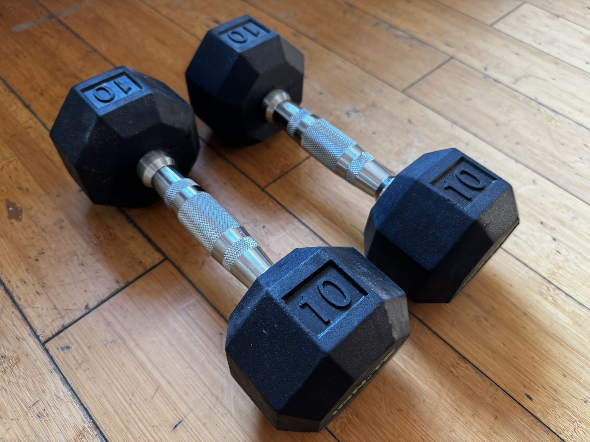 Two 10 pound hand weights by Ignite Hexagon