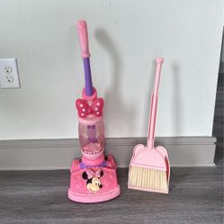 Kids play vacuum and broom 