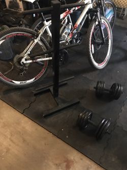 Weight Rack includes 120lbs of metal weights.