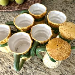 6 Mugs And Salt And Pepper Shaker. 