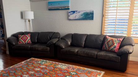 Leather 3 seater couch & ottoman