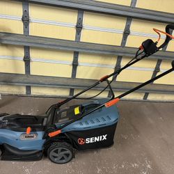 Brand new Lawnmower With Batteries And Charger 