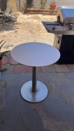 Stain and steel table