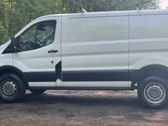 2016 Ford Midtop work van with heavy duty shelving & ladder