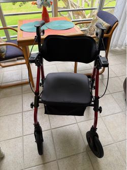 Rollator that converts into a wheelchair.