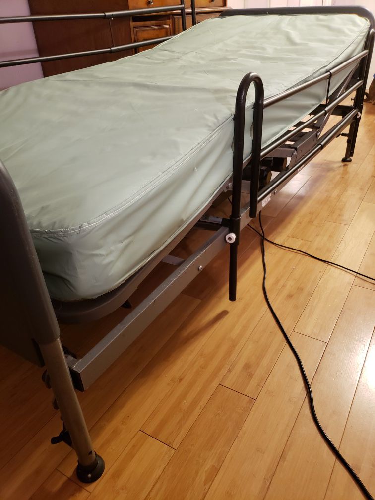 Hospital electric bed, reclining
