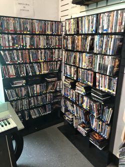 600 DVDs and dvd shelves