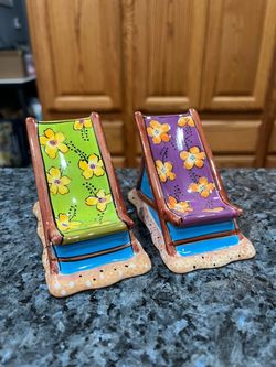 Ceramic Clay Art Beach Lounge Chairs Pair of Salt and Pepper Shakers. Brand new never used stickers on the bottom. Has been on display in a cabinet