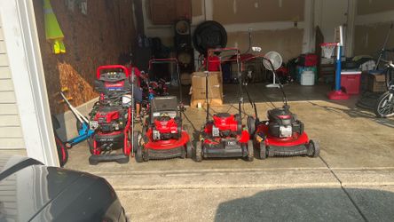 One pressure washer and 4 lawnmowers