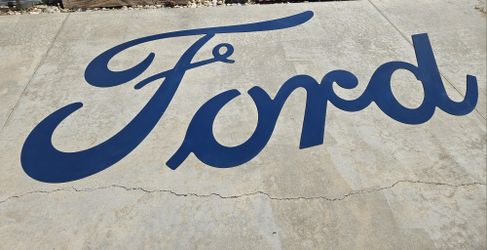Large Ford sign perfect for a shop or man cave!
e