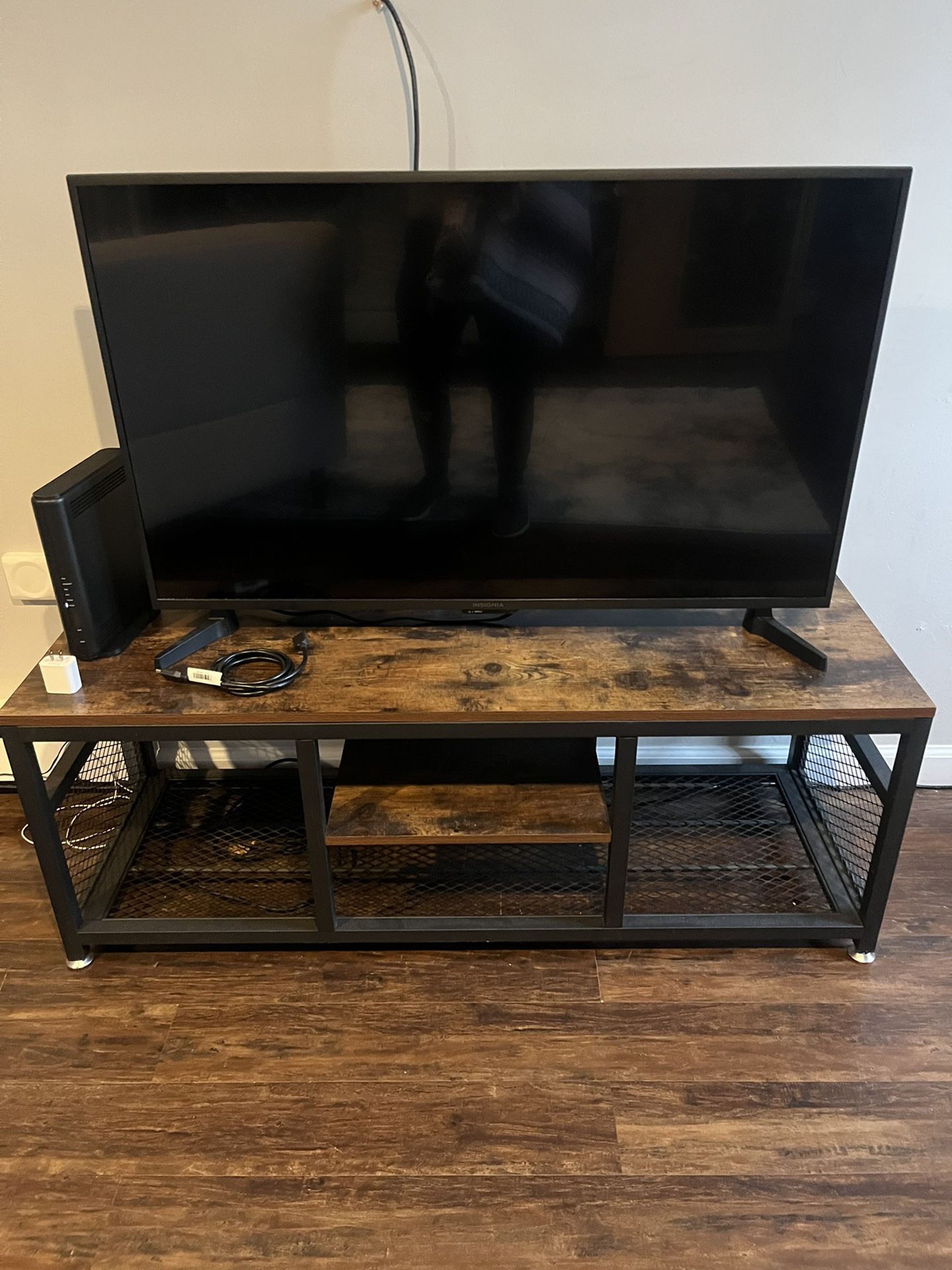 43” Flat screen TV. Amazon fire TV Plus TV Stand