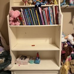 White bookshelf with a drawer