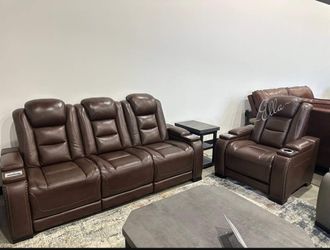 The Man-Den Gray Power Reclining Sofa And Recliner

Ashley Furniture $10 Down Payment And Financing Available