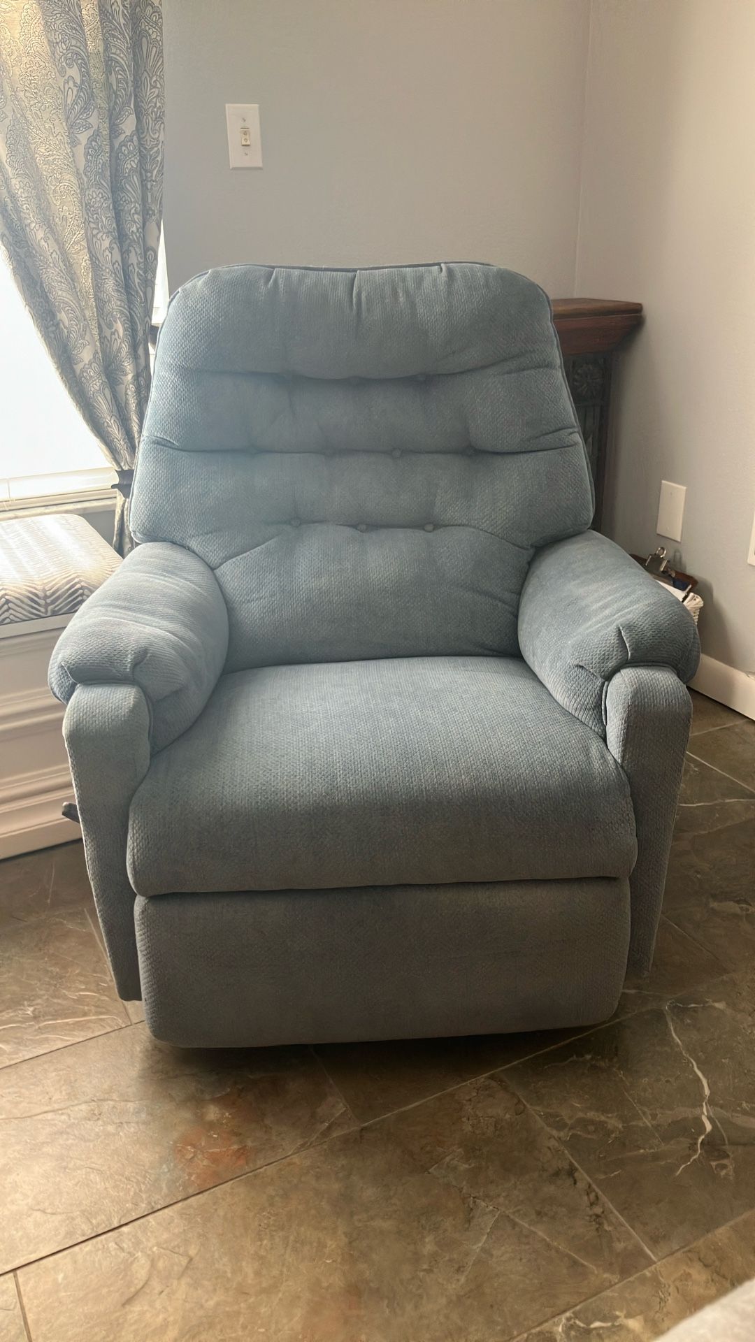 Blue Recliner With handle for reclining. Good Condition. No Smoking,pets or kids. Retired Couple .