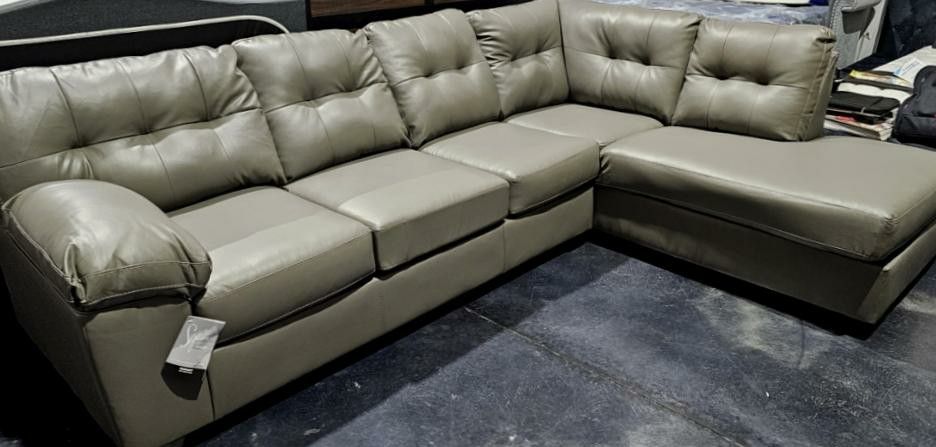 New grey leather sectional chaise