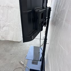 TV Stand  with glass shelves 