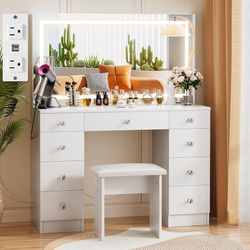 Vanity With Lighted Mirror - Makeup Desk With Power Outlet and 9 Drawers, 3 Color Lighting Modes Adjustable Brightness, 43" Table With Soft Cushioned 