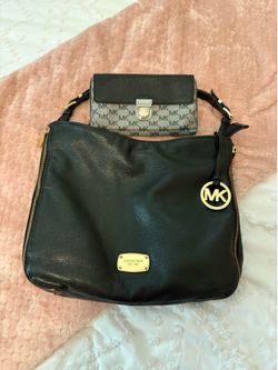 Beautiful Leather Michael Kors Purse and Wallet Set. $55.00
