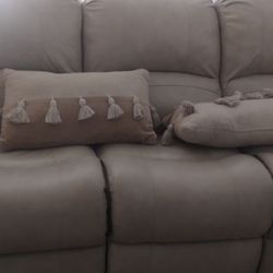 Sofa and two Matching Pillows...Both Side Seats Recline