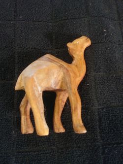 Wood carved camel
