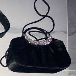 Beautiful Black Satin Clutch with white Rhinestones, has shoulder strap if wanted or can be used as a clutch. NEW.