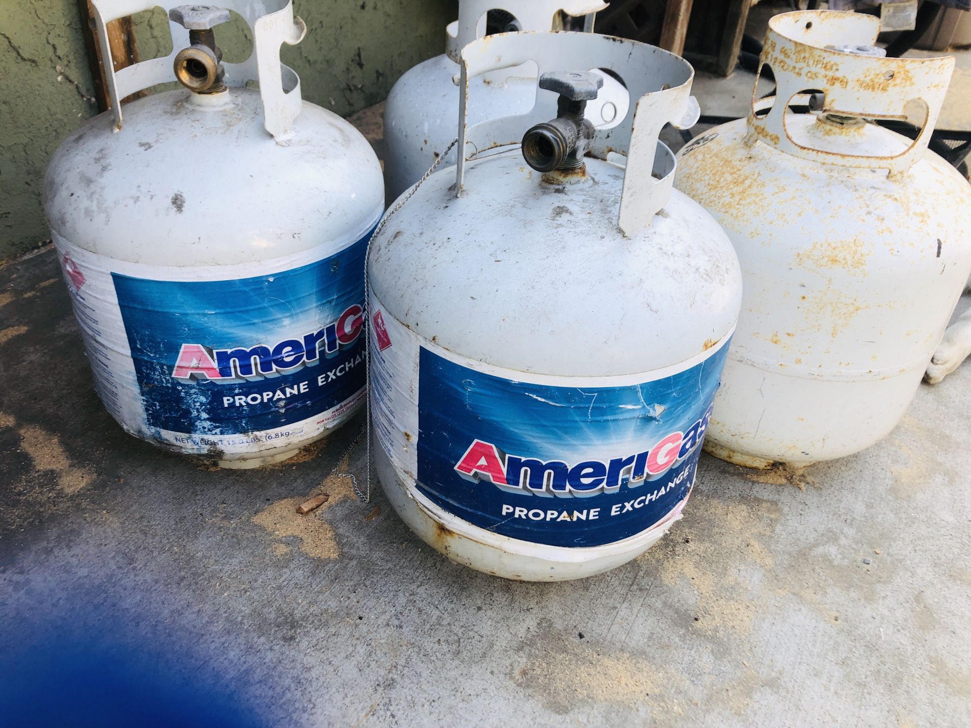 Empty propane tanks for sale for $5each or ALL FOUR for $15