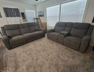 Gray Reclining Sofa and Loveseat