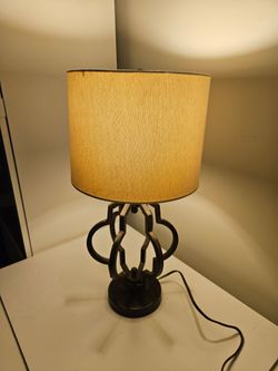 Modern Black Metal Table Lamp With Geometric Openwork Base