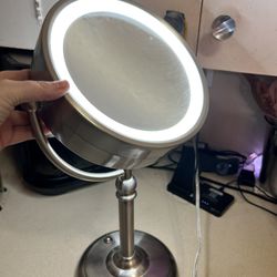 Light up makeup vanity mirror one side is regular other is magnifying 