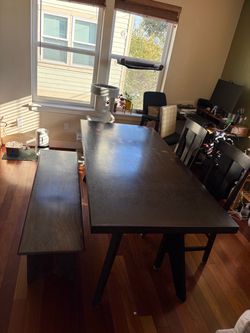 Dark wood dining table set